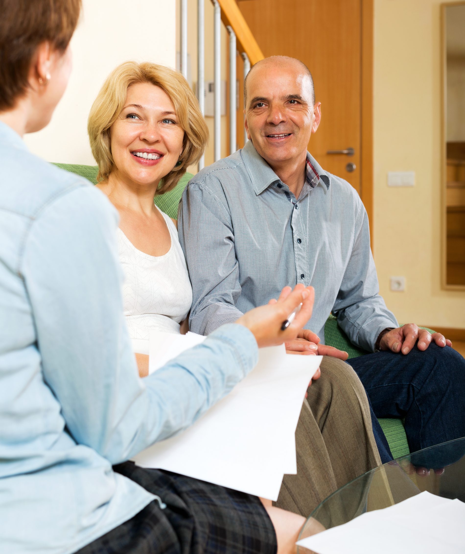 TopQuote adviser reviewing a policy with a couple